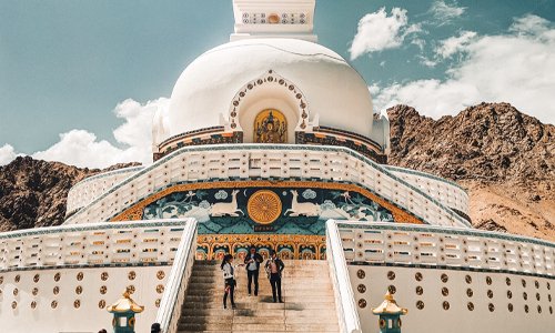 Shanti Stupa, Leh Ladakh, white Buddhist monument with people climbing stairs